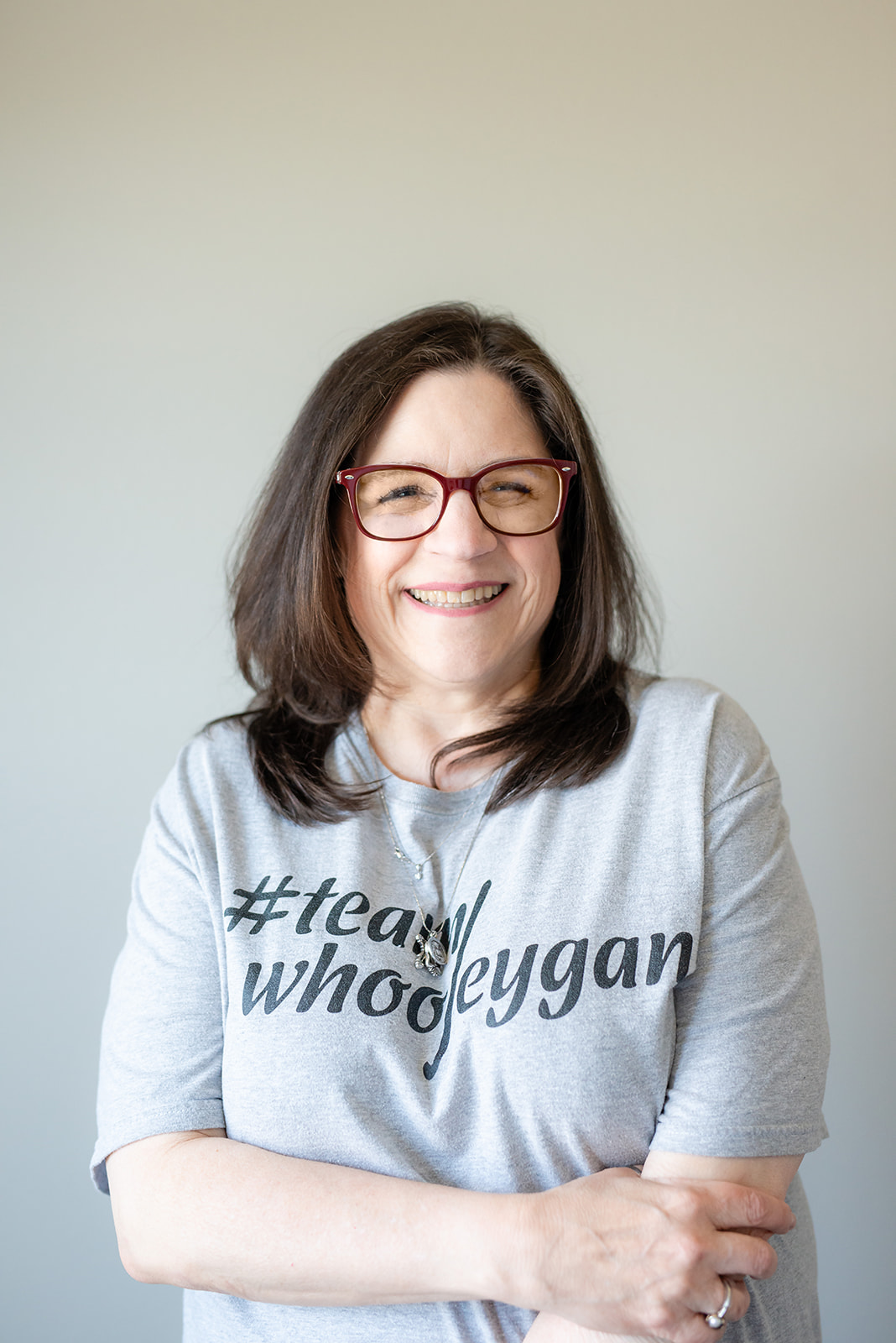 Karen whooley wearing a Team Whooleygan tee shirt